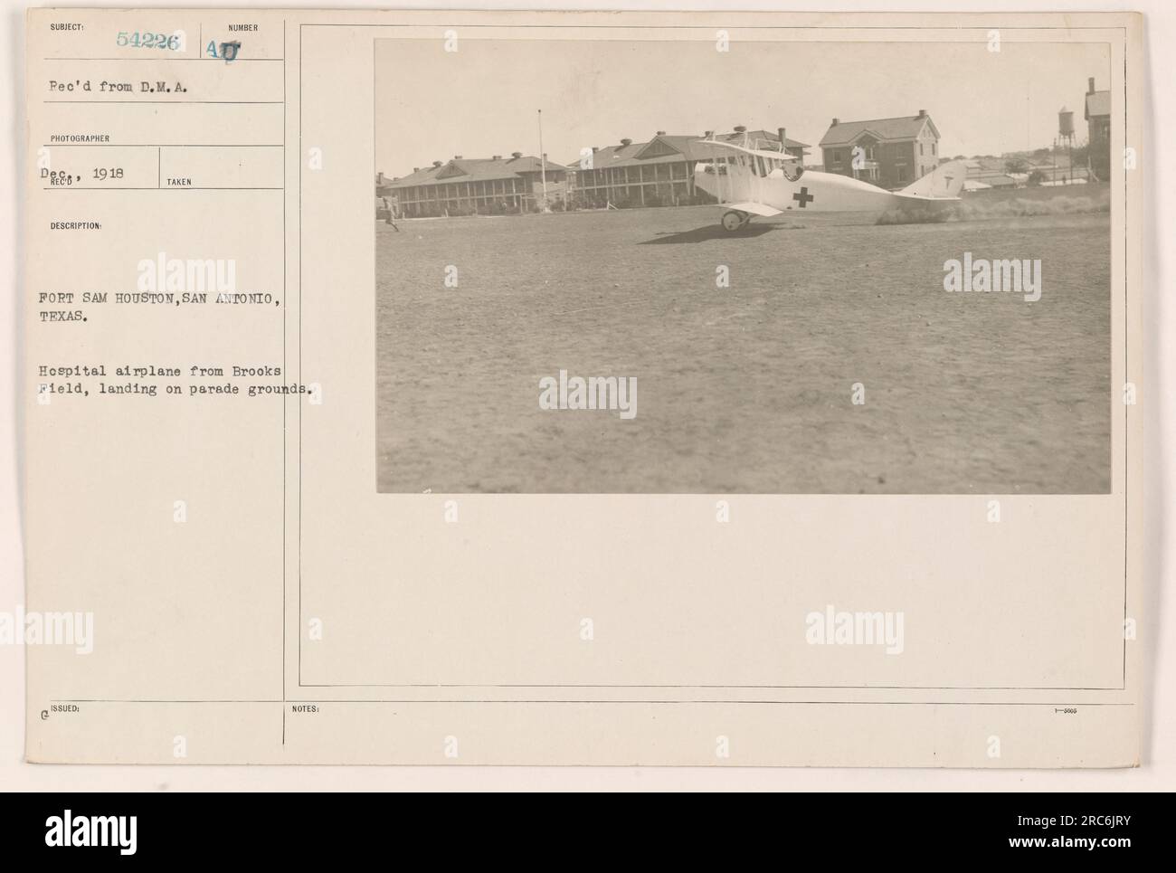 A Hospital Airplane From Brooks Field Lands On The Parade Grounds At a-hospital-airplane-from-brooks-field-lands-on-the-parade-grounds-at