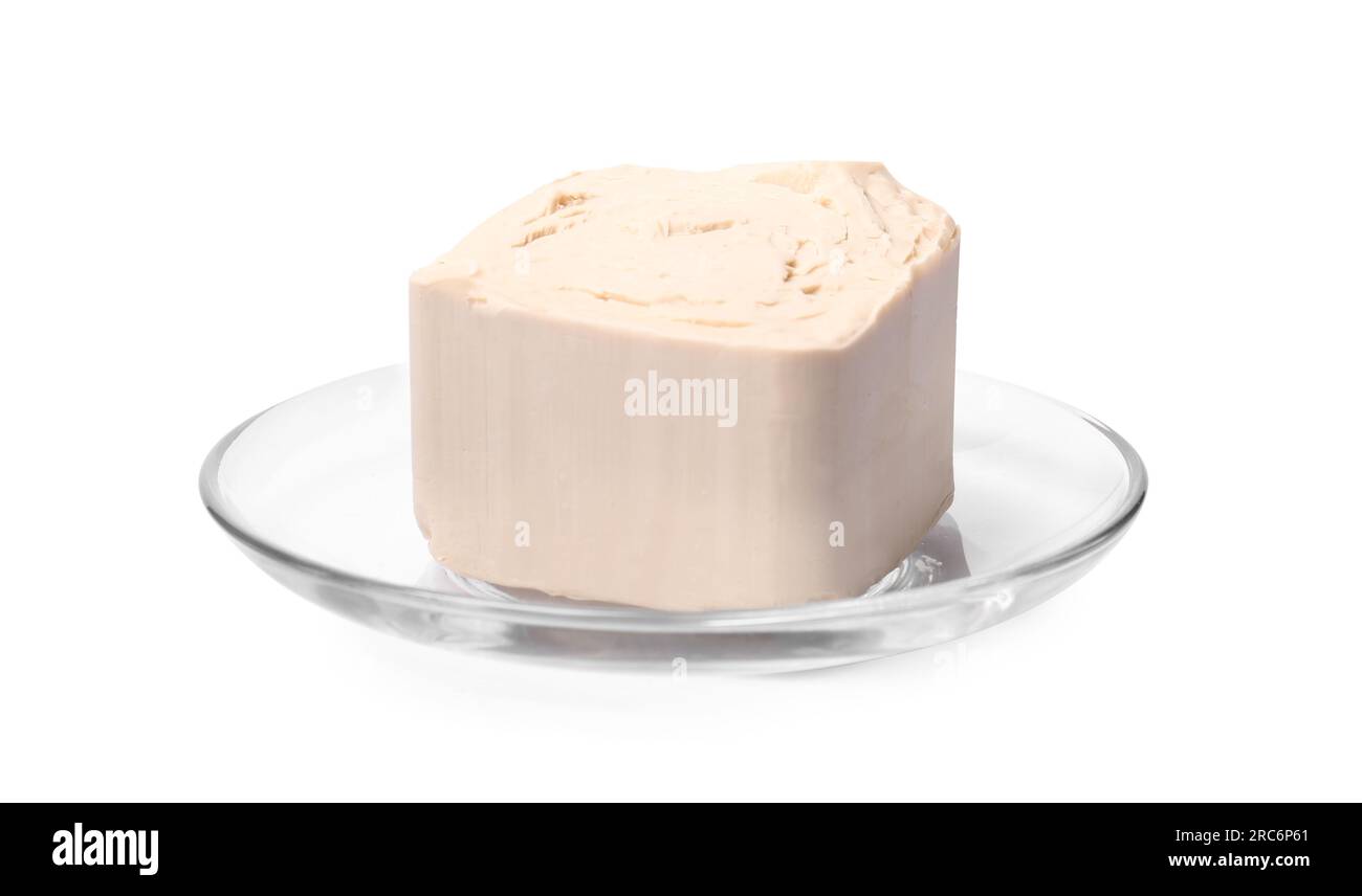 Piece of compressed yeast isolated on white Stock Photo Alamy