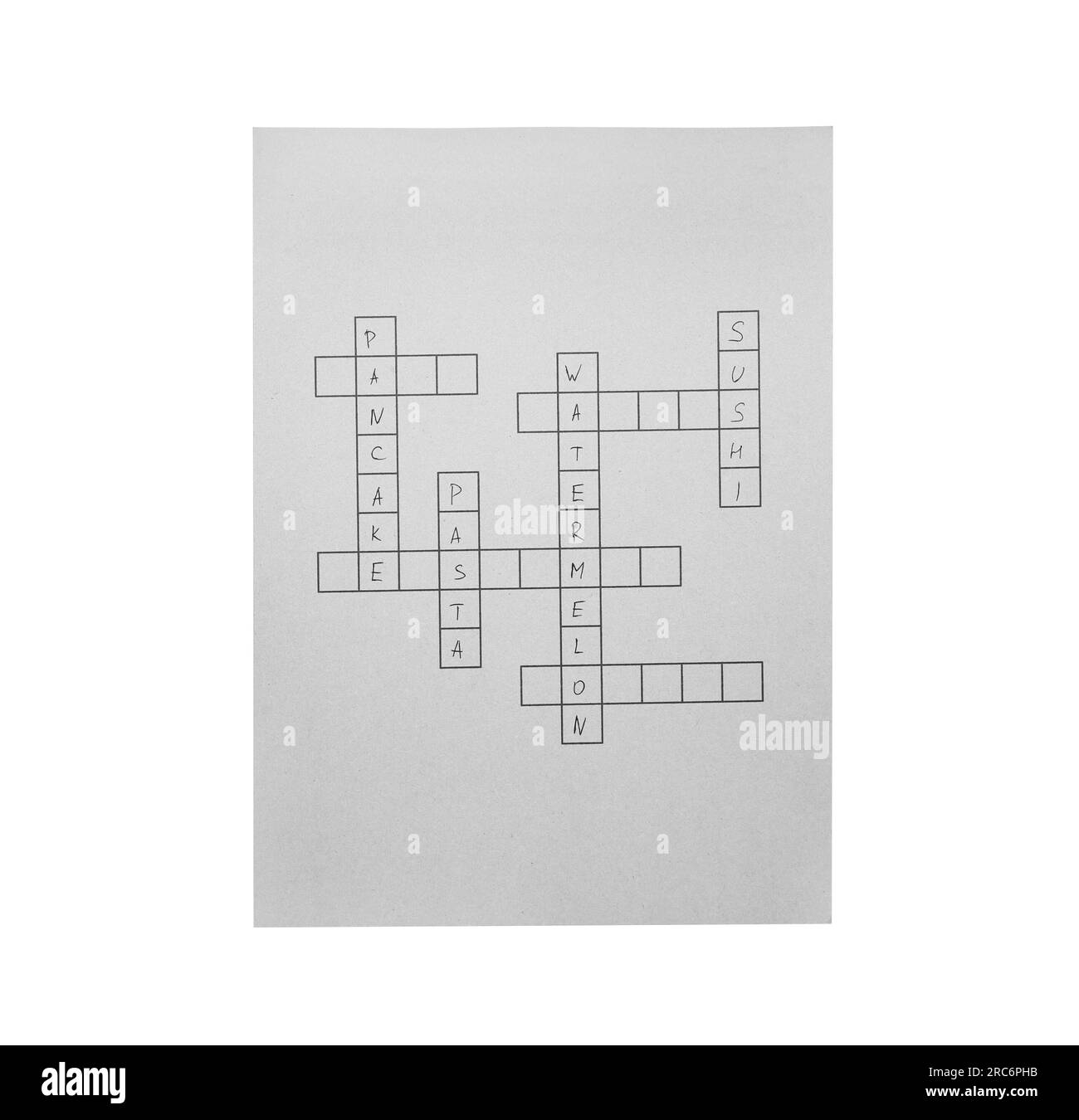 Blank crossword isolated on white, top view. Intellectual entertainment Stock Photo