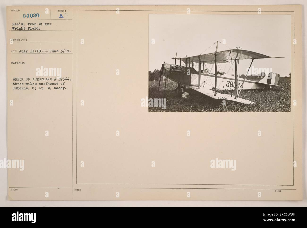Wreck of Aeroplane #39344, located three miles northwest of Osborne, Ohio. The photograph shows the damaged aircraft belonging to Lt. W. Goody. The image was taken on June 3, 1918, and received from Wilbur Wright Field on July 11, 1918. The descriptive label reads as 'BU MOTES: 393 14.' Stock Photo