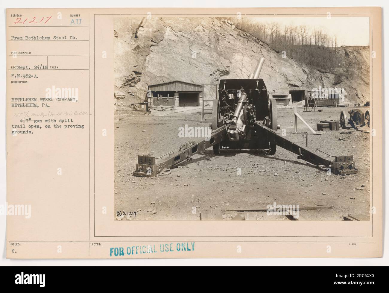 Image depicts a 4.7' gun with a split trail open, located on the proving grounds of Bethlehem Steel Company in Bethlehem, PA. The photo was taken on September 24, 1918, by a photographer from the company. This image is marked for official use only with the reference number 962A. Stock Photo