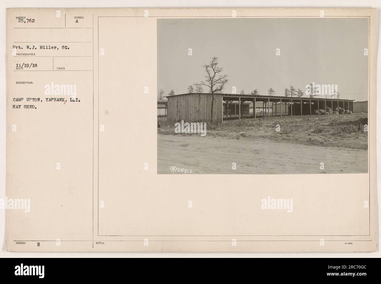 Private W.J. Miller, a photographer, took this photograph on November 19, 1918, at a camp in Yaphank, Long Island. The image shows a hay shed with the symbol 'H' on it. This is a documentation of American military activities during World War One. Stock Photo