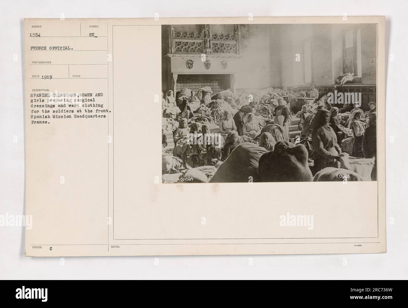 Spanish clergymen, women, and girls at the Spanish Mission Headquarters