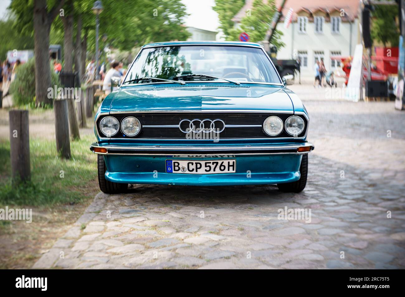 WERDER (HAVEL), GERMANY - MAY 20, 2023: The mid-size car Audi 100 Coupe S, 1976. Swirl bokeh, art lens. Oldtimer - Festival Werder Classics 2023 Stock Photo