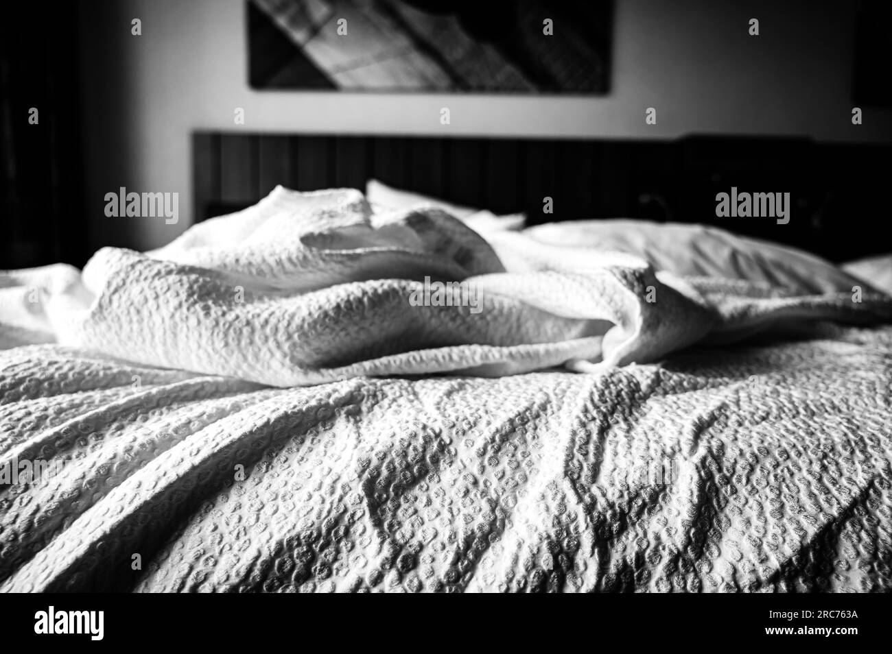 crumpled sheets of a hotel bed in the morning Stock Photo Alamy