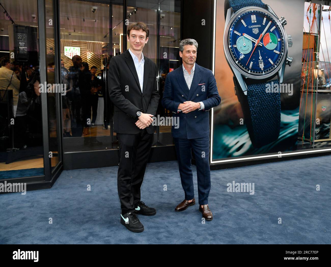 TAG Heuer CEO Frederic Arnault, left, and Patrick Dempsey attend the TAG  Heuer Fifth Avenue Flagship store opening on Wednesday, July 12, 2023, in  New York. (Photo by Evan Agostini/Invision/AP Stock Photo 