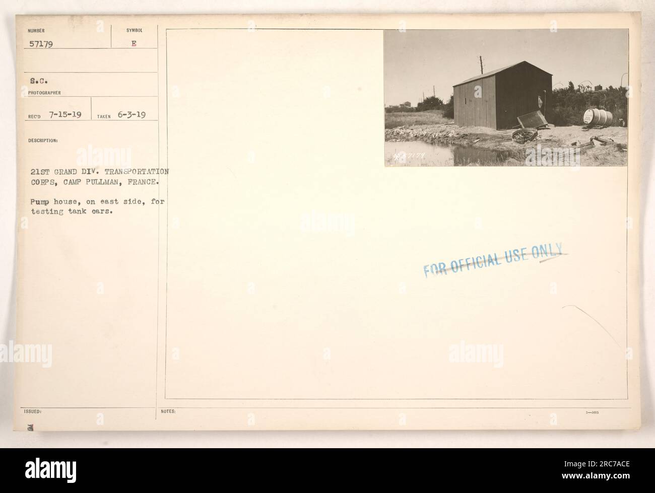 A pump house on the east side of Camp Pullman in France is used for testing tank cars. The tank cars in question have the number 57179 S.C. This photograph was taken by RECO on July 15, 1919 and described as belonging to the 21st Grand Division Transportation Corps. Stock Photo