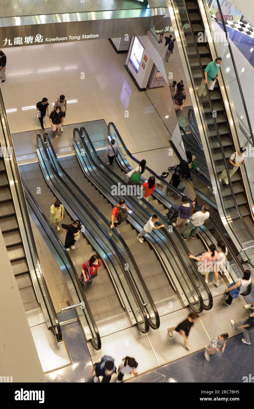 Escalators into Festival Walk Shopping Mall (popular with Mainland ...