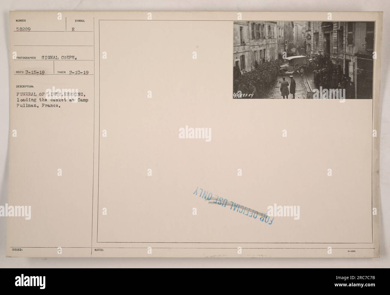 casket containing the remains of Lieutenant Herring being loaded onto a