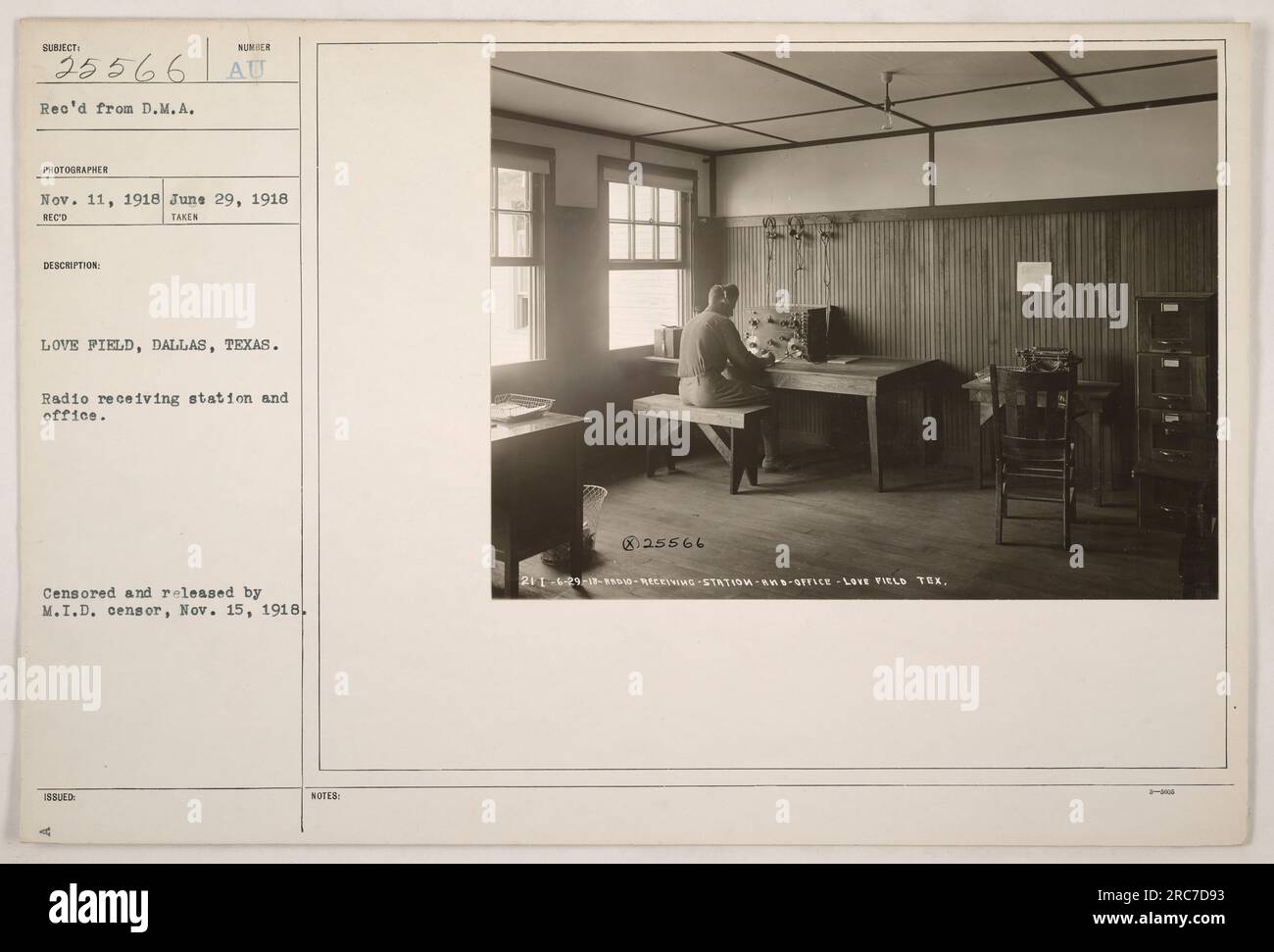 A photograph taken on June 29, 1918, at Love Field in Dallas, Texas. The  image depicts a radio receiving station and office. It was received and  censored by the M.I.D. and released