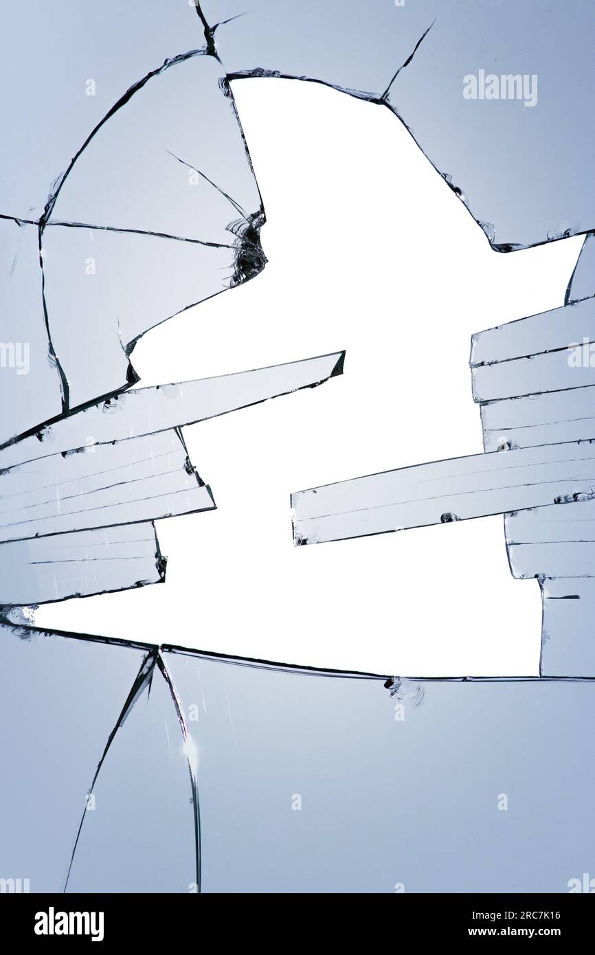 A broken window with shards and a hole in the center. Pieces of glass on a white background Stock Photo