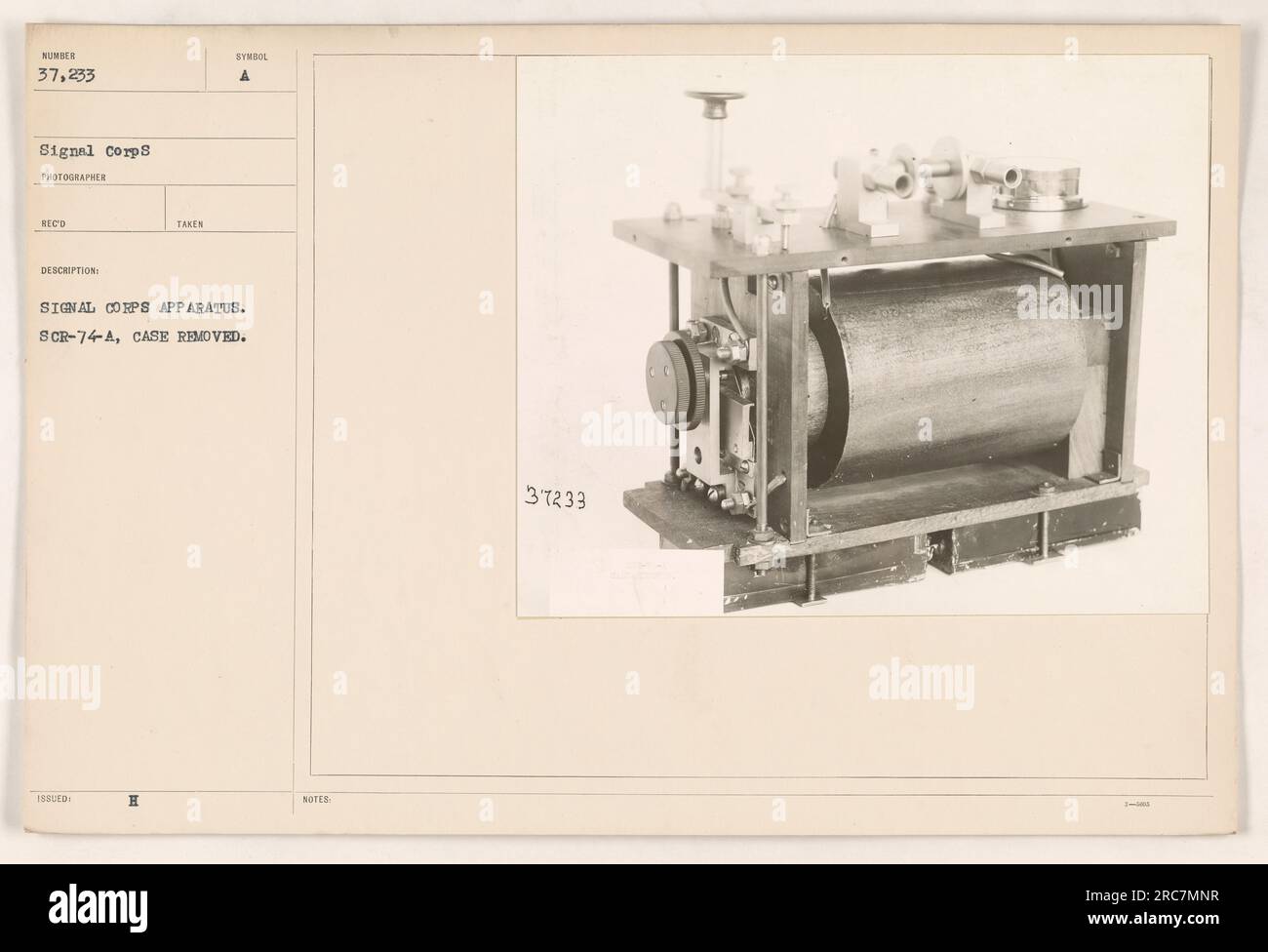 A photograph showing a Signal Corps apparatus, specifically the SCR-74-A, with its case removed. The image is numbered 37,233 in the collection and is described as 188LED TAKEN SIGNAL. Stock Photo