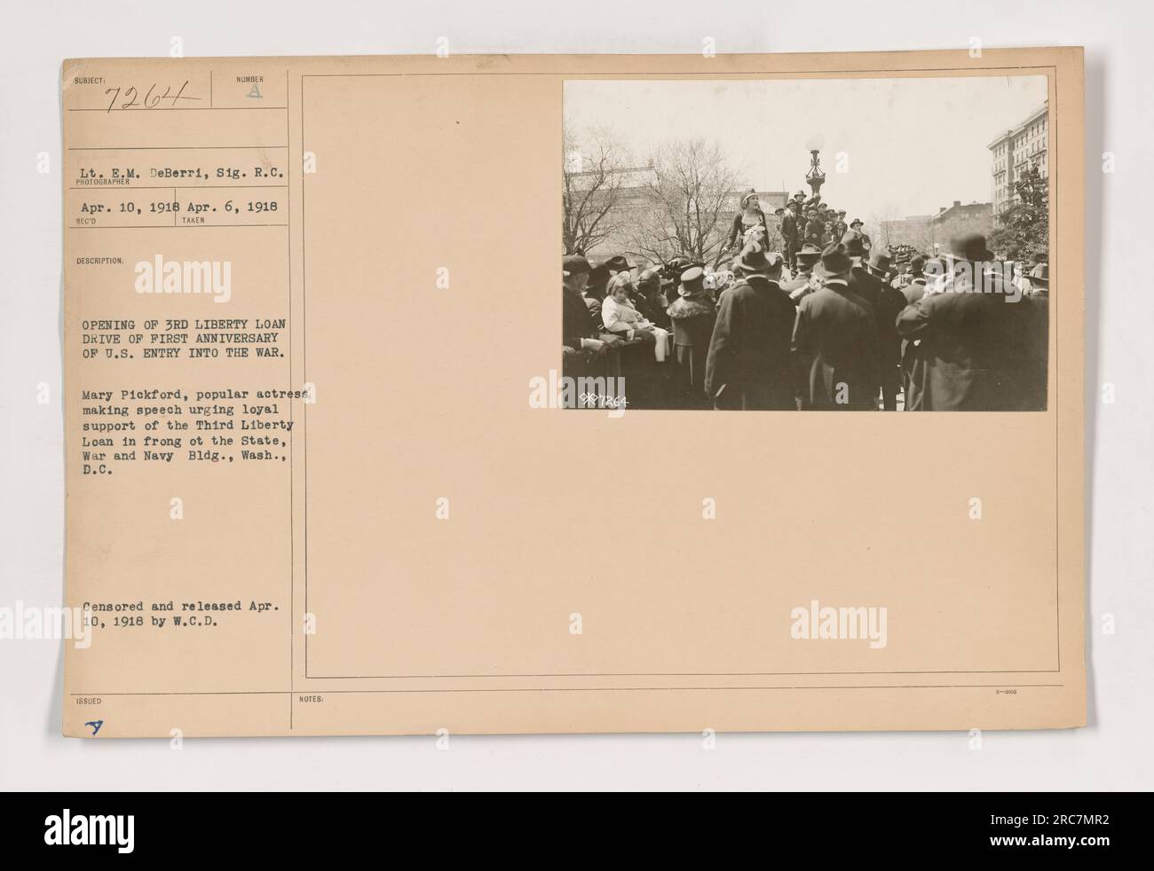 Mary Pickford, a popular actress, giving a speech urging support for the Third Liberty Loan during the opening ceremony on the first anniversary of the US entry into World War One. The photograph was taken on April 6, 1918, in front of the State, War, and Navy Building in Washington, D.C. Stock Photo