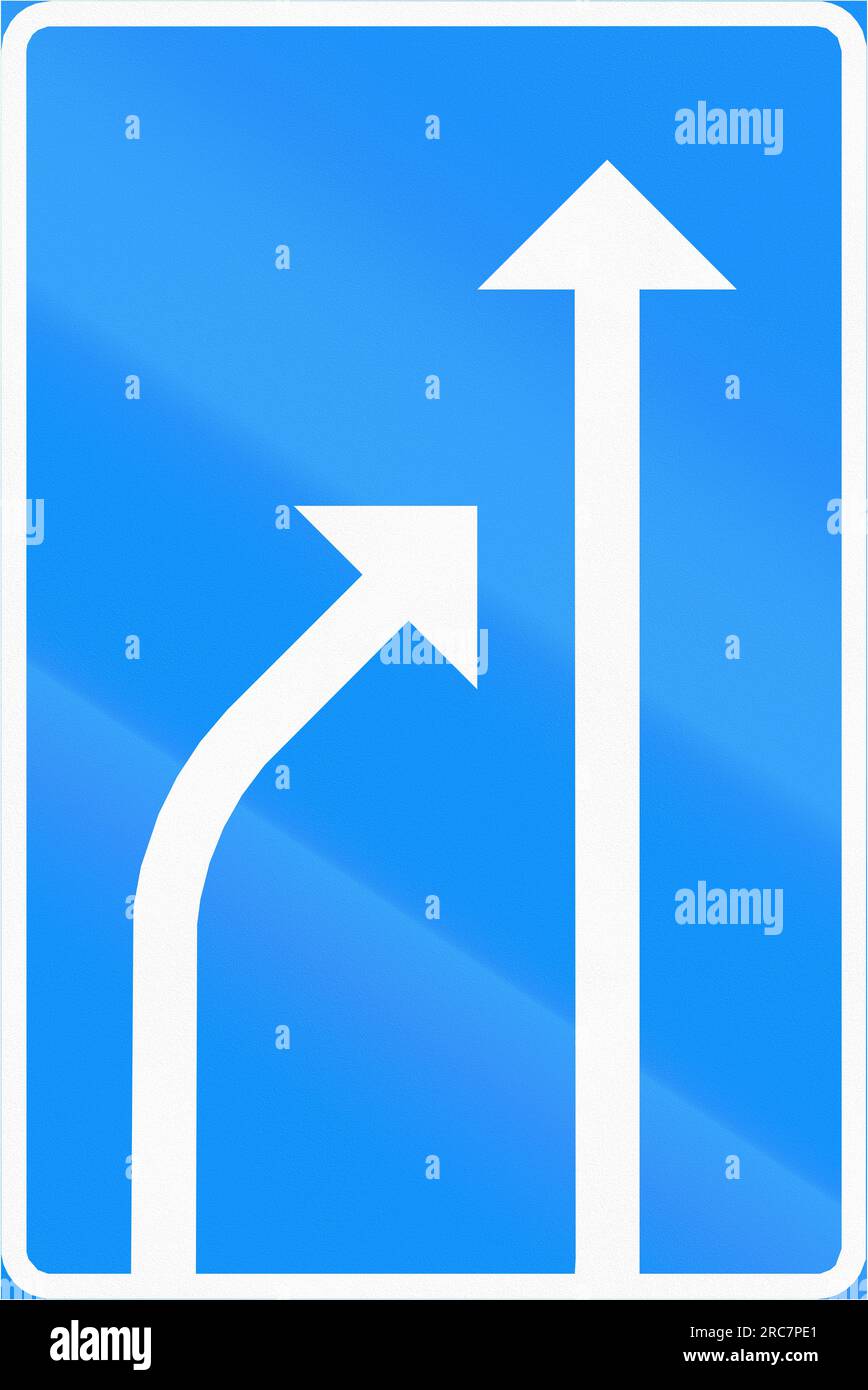 Finnish road sign: The left lane ends Stock Photo - Alamy