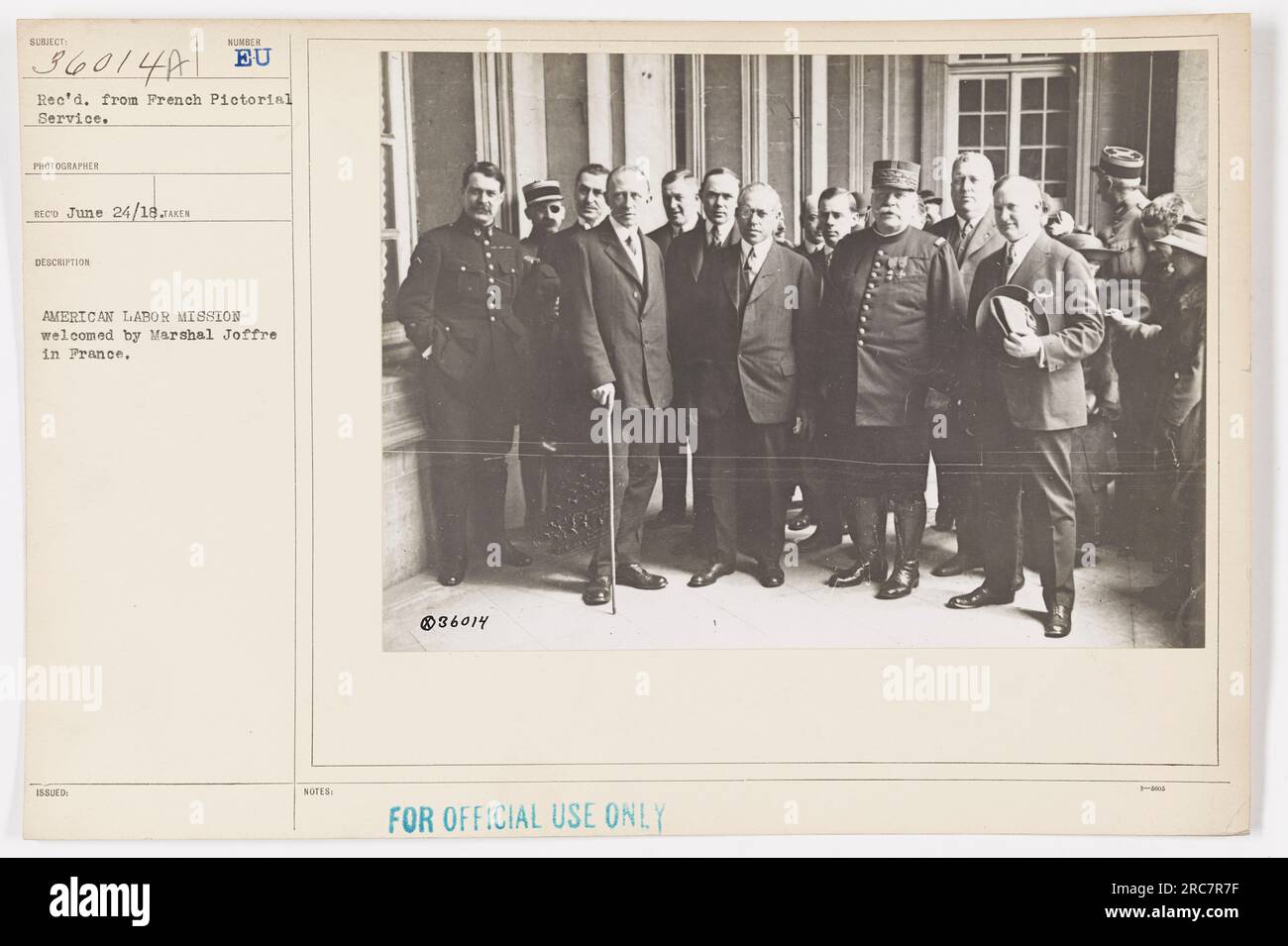 American Labor Mission being welcomed by Marshal Joffre in France during World War I. The photograph was taken by photographer BECO on June 24, 1918. The image is part of the 111-SC-36014a series from the French Pictorial Service. It is labeled 'FOR OFFICIAL USE ONLY.' Stock Photo