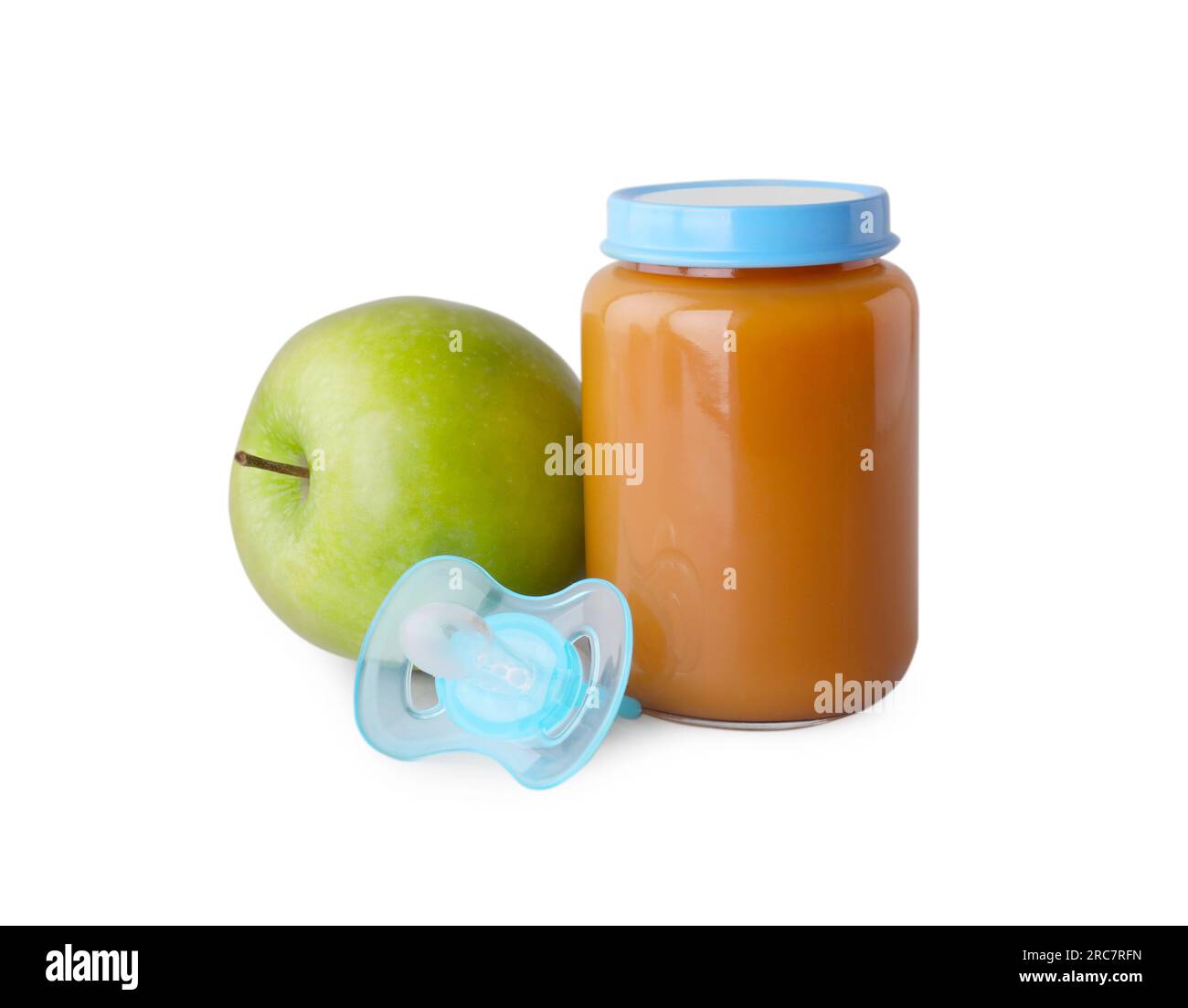 Healthy baby food, apple and pacifier on light grey background Stock ...