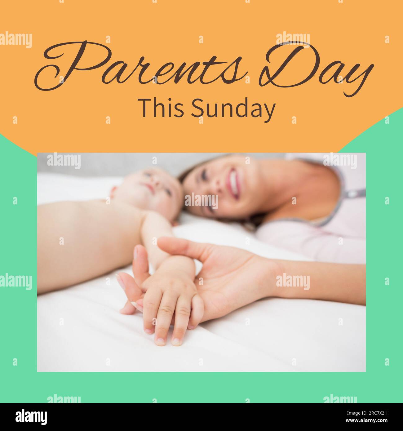 Parents day, this sunday text on orange with happy caucasian mother holding baby's hand Stock Photo