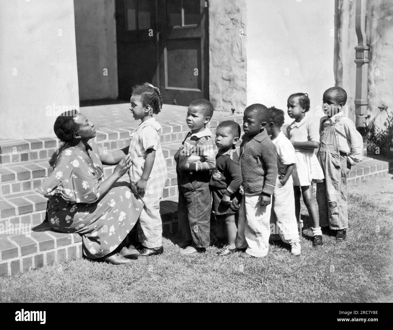 Oakland, California c. 1935. Children at the Prescott School get a