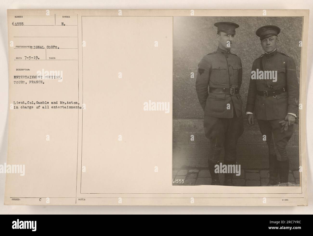 Lieutenant Colonel Gamble and Mr. Acton, in charge of organizing entertainments for the American military stationed in Tours, France. This photograph was taken on March 7, 1919, and is part of the collection of photographs depicting American military activities during World War I. Stock Photo