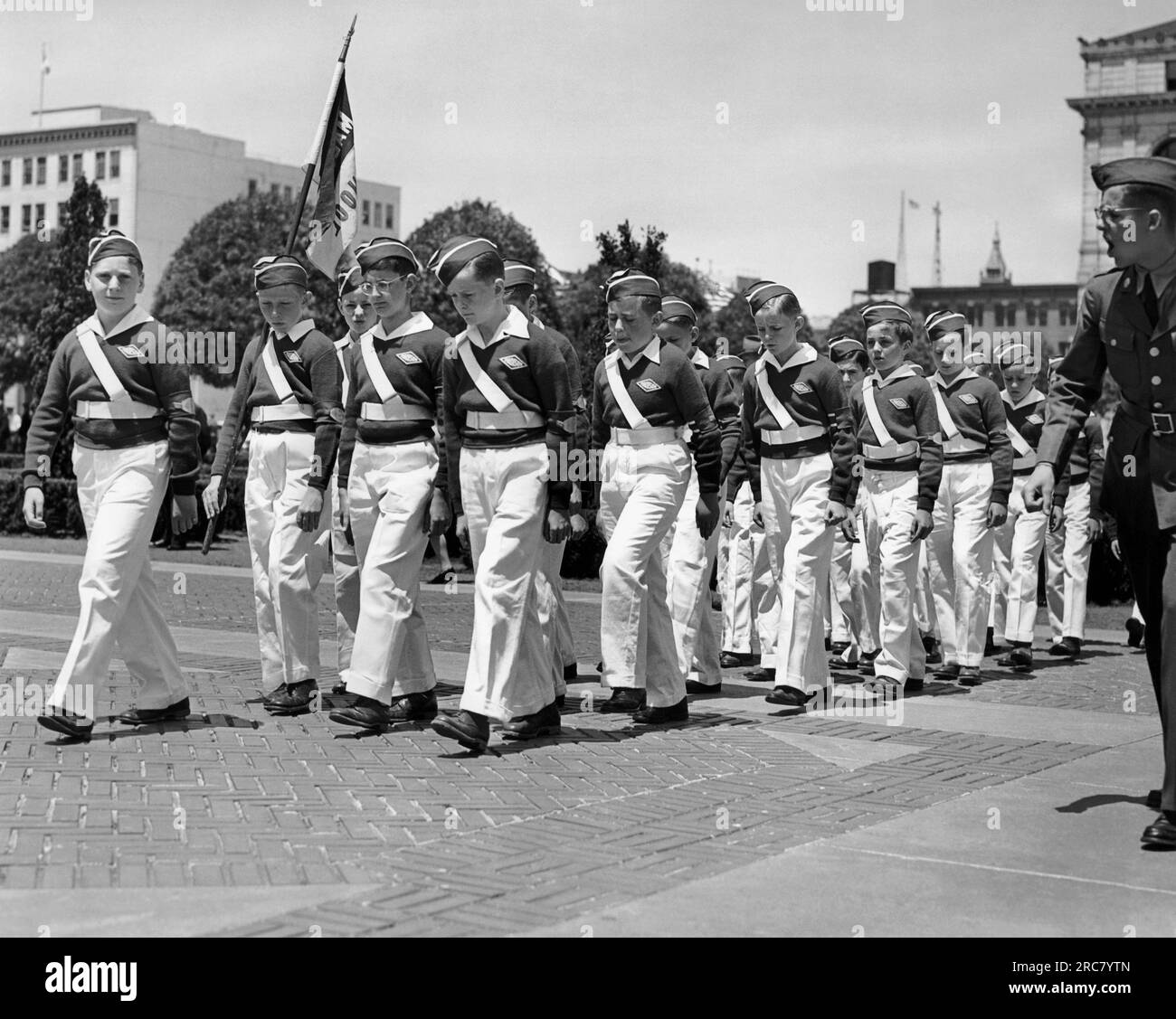 United States  c.  1950 Students at the Madison School being harshly drilled in formation by an officer. Stock Photo