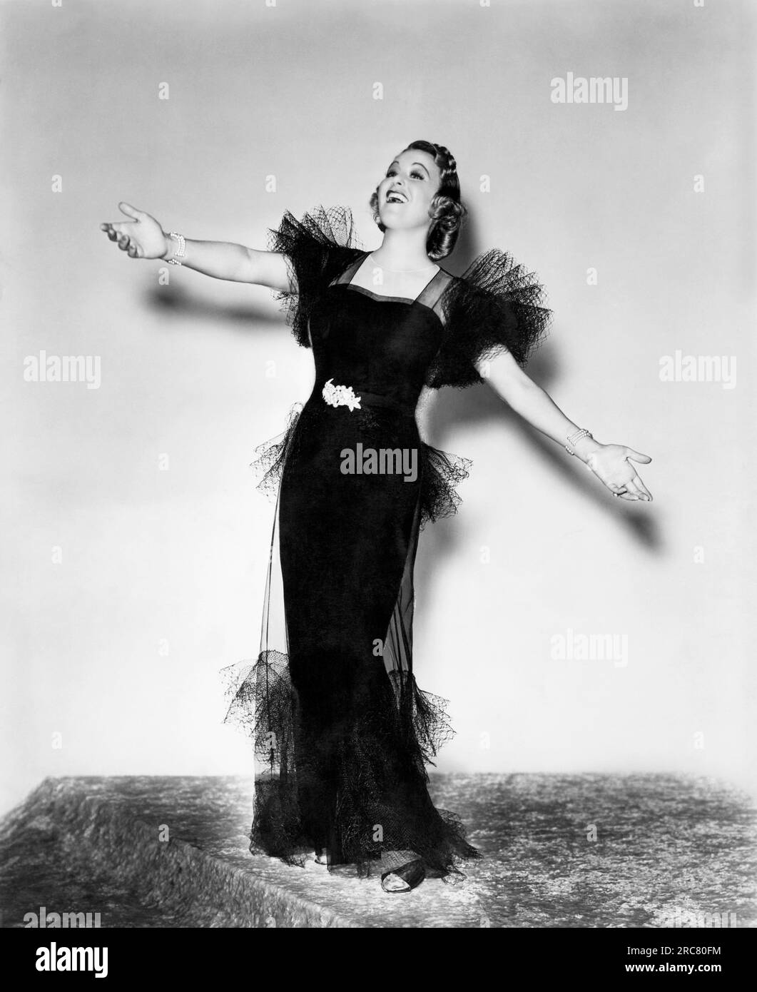 Hollywood, California: 1937 Opera star Grace Moore as she renders the