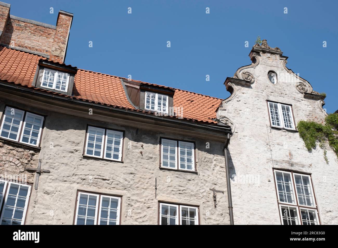 Houses above the Swedish Gate on Torņa street in Riga. The gate was a part of the Riga Wall to provide access to barracks outside the city Stock Photo