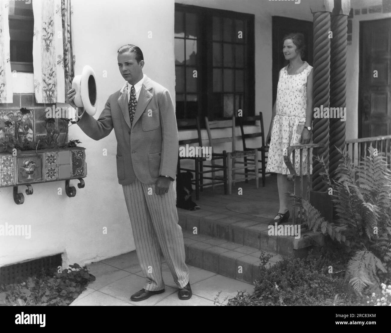 San Gabriel, California 1927 A still life of a man leaving his house