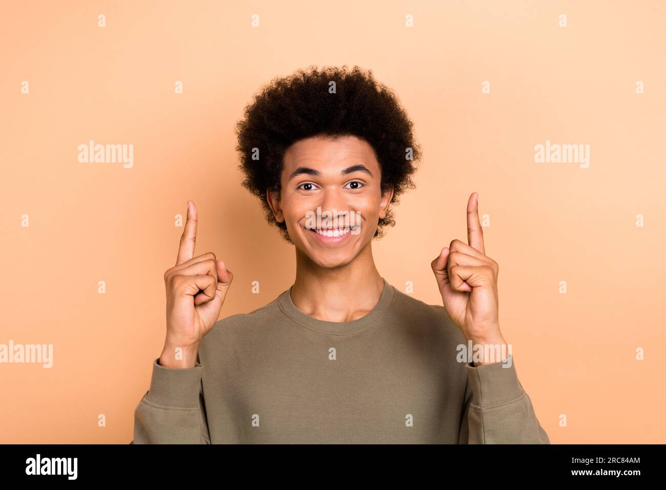 Portrait of good mood toothy beaming person afro hairdo dressed khaki ...