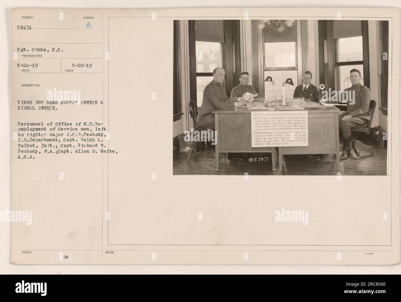 Personnel of the Office of W.D. Redeployment of Service Men posing for a photograph. From left to right: Major J.C.R. Peabody from I.G. Department, Capt. Ralph L. Talbot from Infantry, Capt. Richard R. Peabody from Field Artillery, and Capt. Allen G. Waite from Army Signal Corps. This image captures the gathering of these individuals. Stock Photo