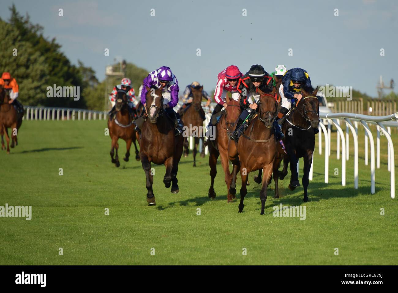 Bath, UK. 12th July 2023. Moonspirit (Black silks), ridden by Billy Loughnane, wins the 19.40 Blackmore Facilities Management Stakes at Bath Racecourse, UK. Credit: Paul Blake/Alamy Live News. Stock Photo