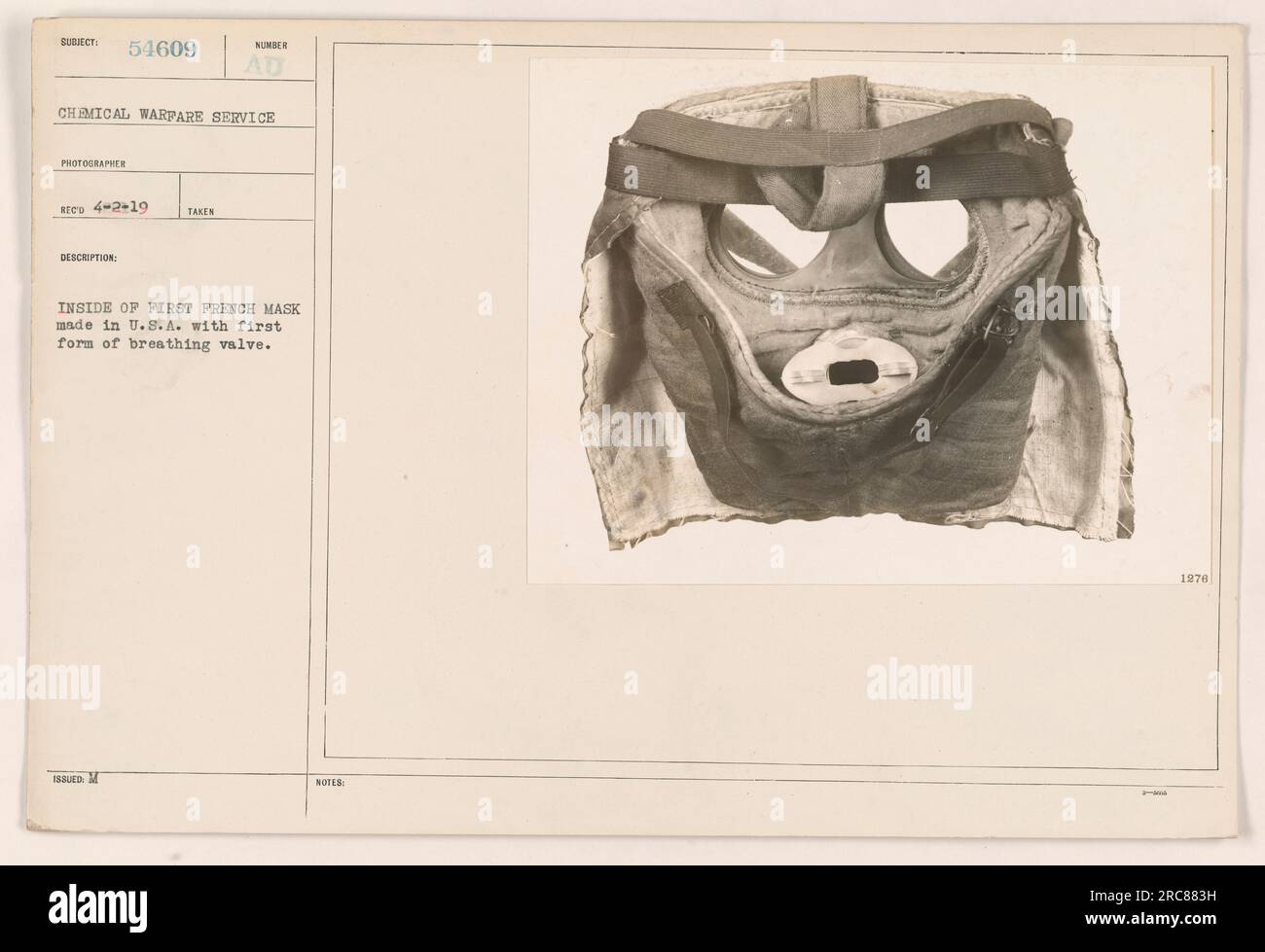 Interior of the first French mask produced in the United States during World War One. The mask features the initial design of a breathing valve. Photographed on April 2nd, 1919, by Reed of the Chemical Warfare Service. This image corresponds to the number 54609 in the series and carries the designation 'AU Issued.' Stock Photo
