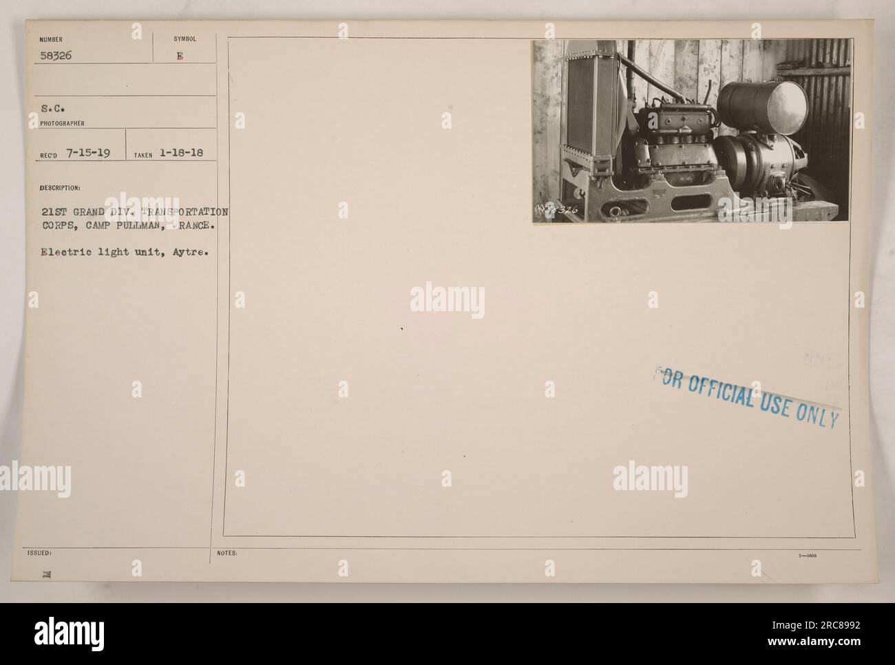 21st Grand Division Transportation Corps at Camp Pullman in France showcases an electric light unit, Aytre, in this photograph. The symbol issued to the 21st Grand Division Transportation Corps is visible. The picture was taken on January 18, 1918, and the photographer description is ECD 7-15-19. Notes indicate that the image is for official use only. Stock Photo