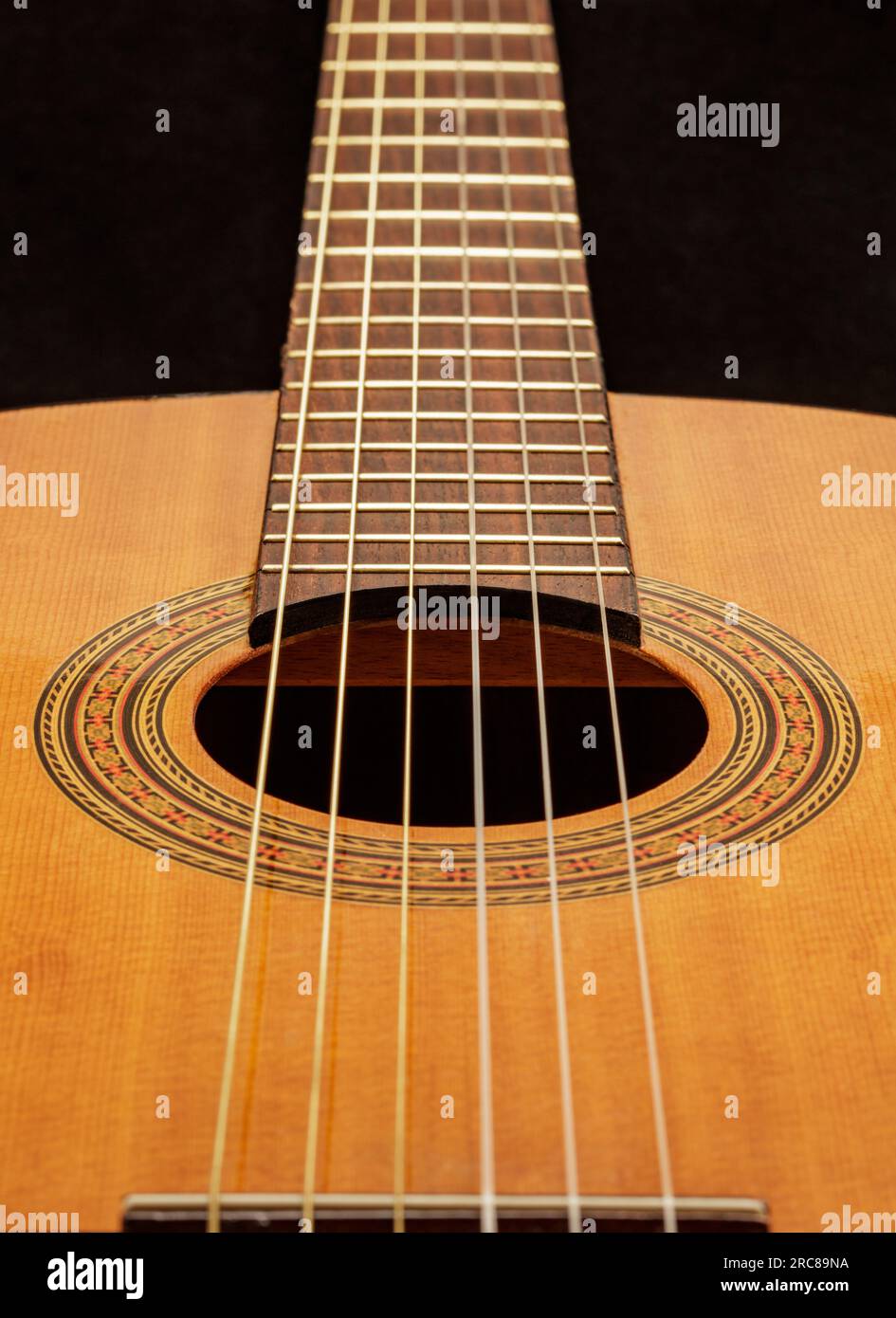 Classic acoustic six string guitar close up Stock Photo