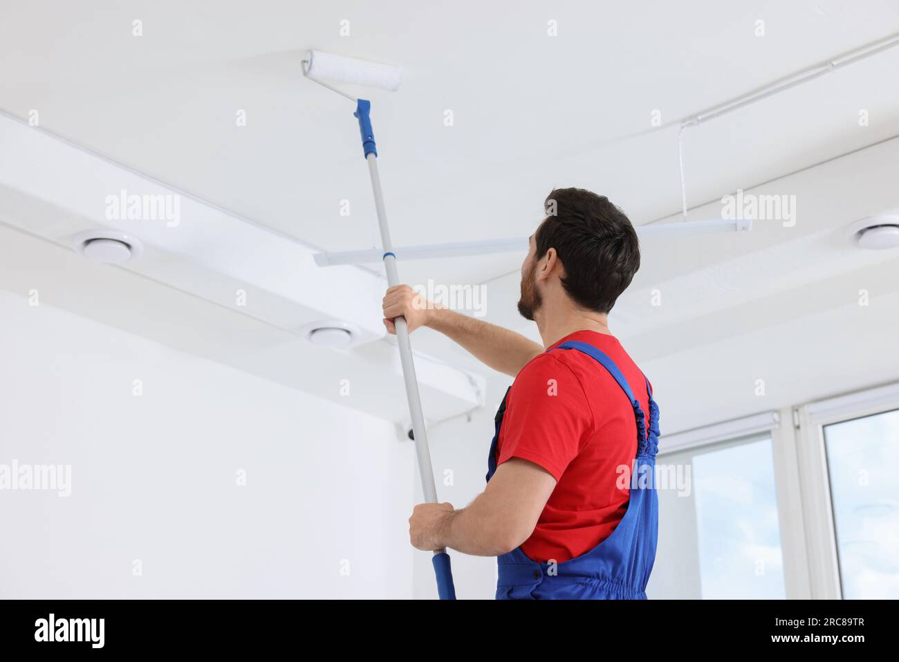 Painting ceiling roller hi-res stock photography and images - Alamy