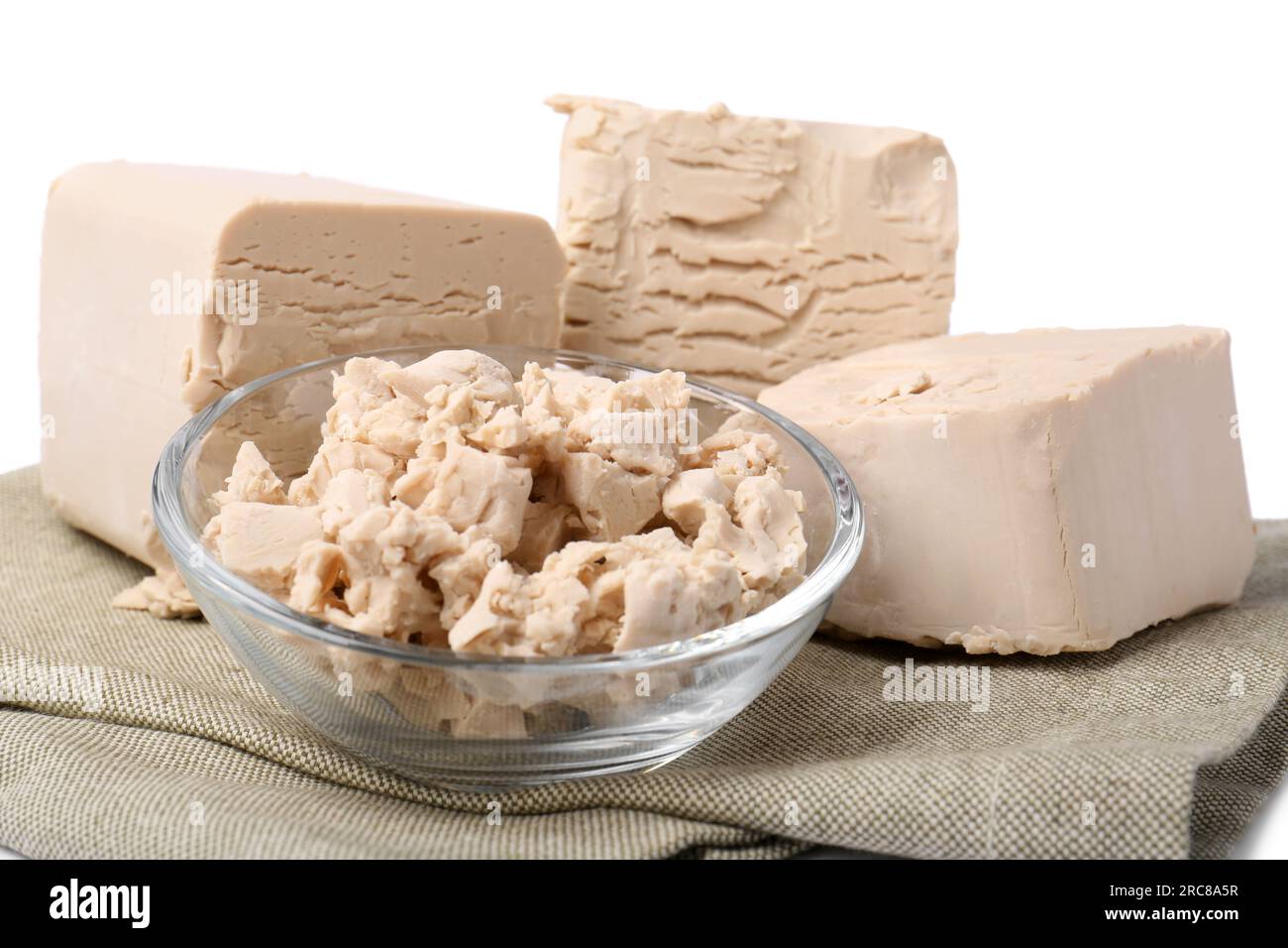 Pieces of compressed yeast isolated on white, closeup Stock Photo Alamy