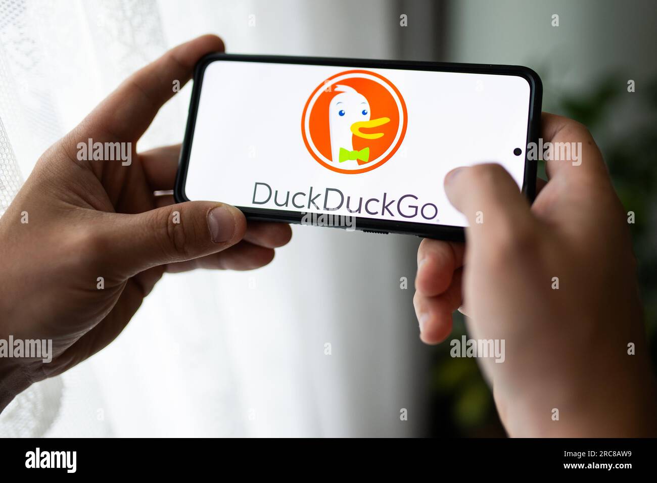 In this photo illustration a DuckDuckGO logo seen displayed on a