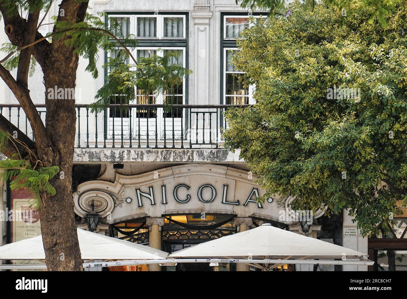 Café Nicola in Lisbon, Portugal. Famous café located on the inner-city square Praça de Dom Pedro IV, King Pedro IV Square, better known as Rossio. Stock Photo