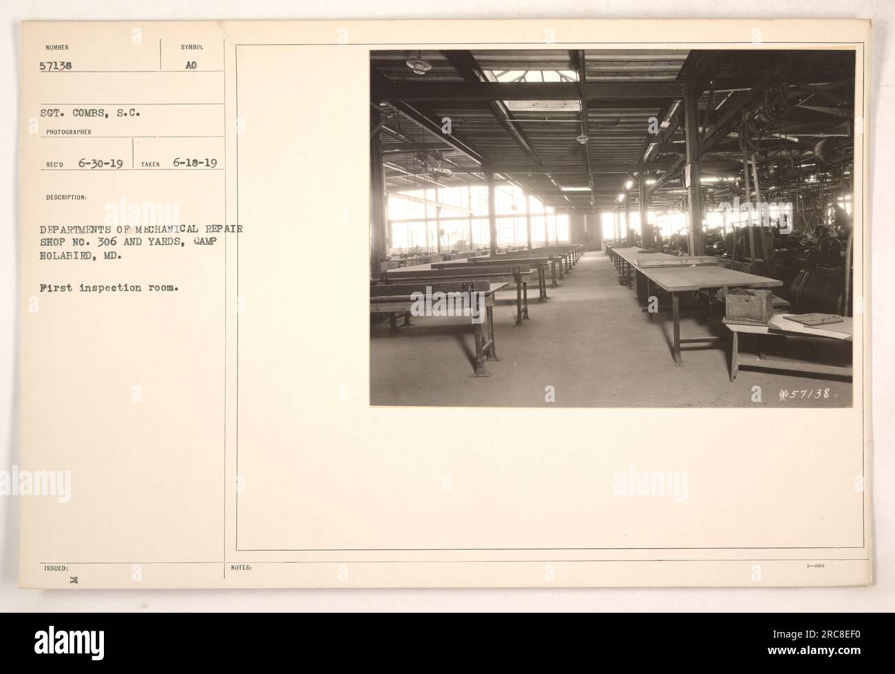 Interior view of the first inspection room at Departments of Mechanical Repair Shop No. 306 and Yards, located at Camp Holabird in Maryland. The photograph was taken on June 18, 1919, by Sergeant Combs, a military photographer. It is part of the records marked with the symbol 'AO Departments OP Mechanical Repair Shop No. 306 and Yards.' Stock Photo