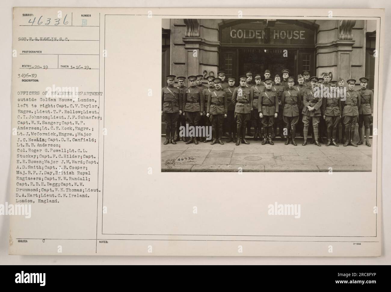 Officers of the Engineer Department are seen outside the Golden House in London. The image was taken on January 16, 1919. The officers, from left to right, are: Captain C.V. Taylor, Lieutenant T.P. Rollow, Lieutenant C.I. Johnson, Lieutenant J. F. Schaefer, Captain W. N. Sanger, Captain W. P. Anderson, Lieutenant C. E. Kock, Lieutenant J. McCormick, Major J.C. Newlin, Captain D. H. Canfield, Lieutenant B. B. Anderson, Colonel Roger G. Powell, Lieutenant C. L. Stuckey, Captain F. C. Hilder, Captain E. R. Bowen, Major J.M. Ward, Captain A.D. Smith, Captain J. B. Cooper, Major B.P.J.Day of the Br Stock Photo