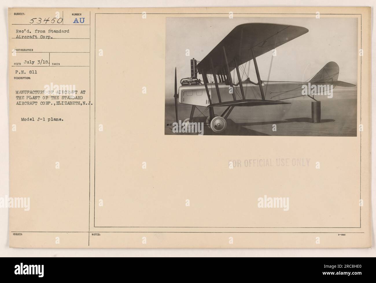 The image shows the manufacturing process of aircraft at the plant of the Standard Aircraft Corp. in Elizabeth, New Jersey during World War I. Specifically, it depicts the production of a Model J-1 airplane. The photograph was taken on July 3, 1918, in the afternoon. The evidence confirms the authenticity, and it also bears the note 'For Official Use Only.' Stock Photo