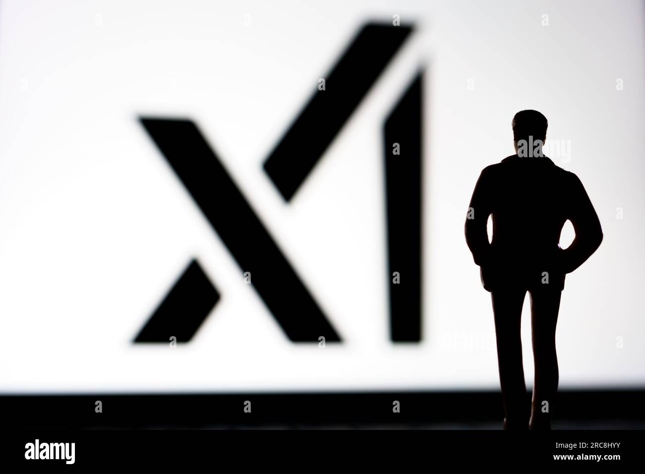 xAI company logo seen on the screen. Elon Musk created artificial