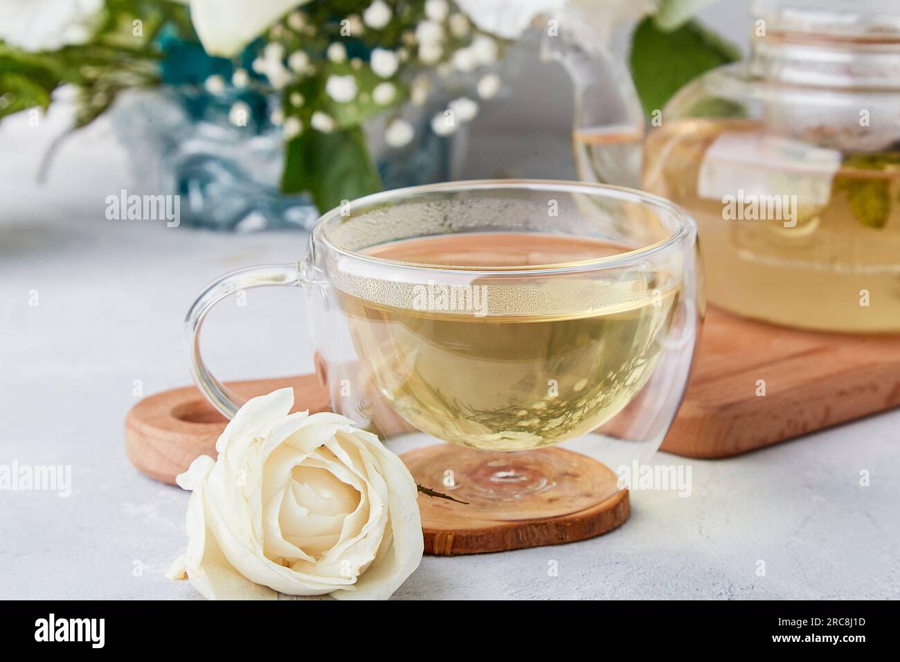 Herbal tea cup, aesthetic tea time in biophilic interior among white