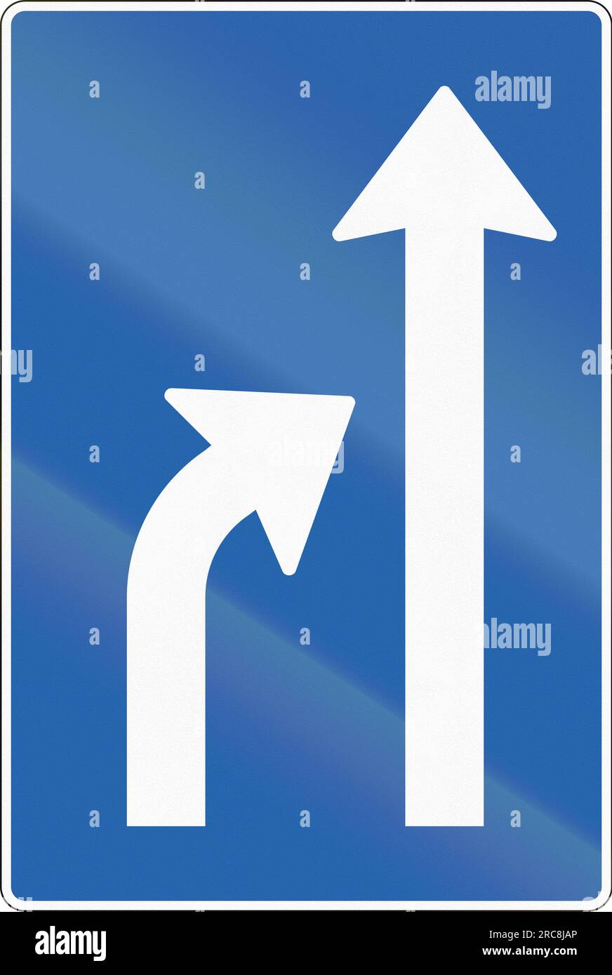 Icelandic road sign: The left lane ends Stock Photo - Alamy