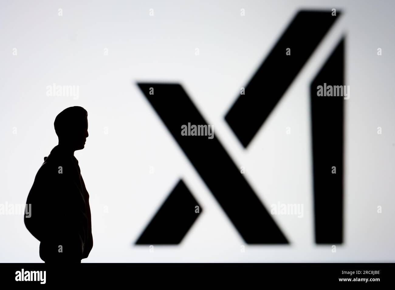 xAI company logo seen on the screen. Elon Musk created artificial