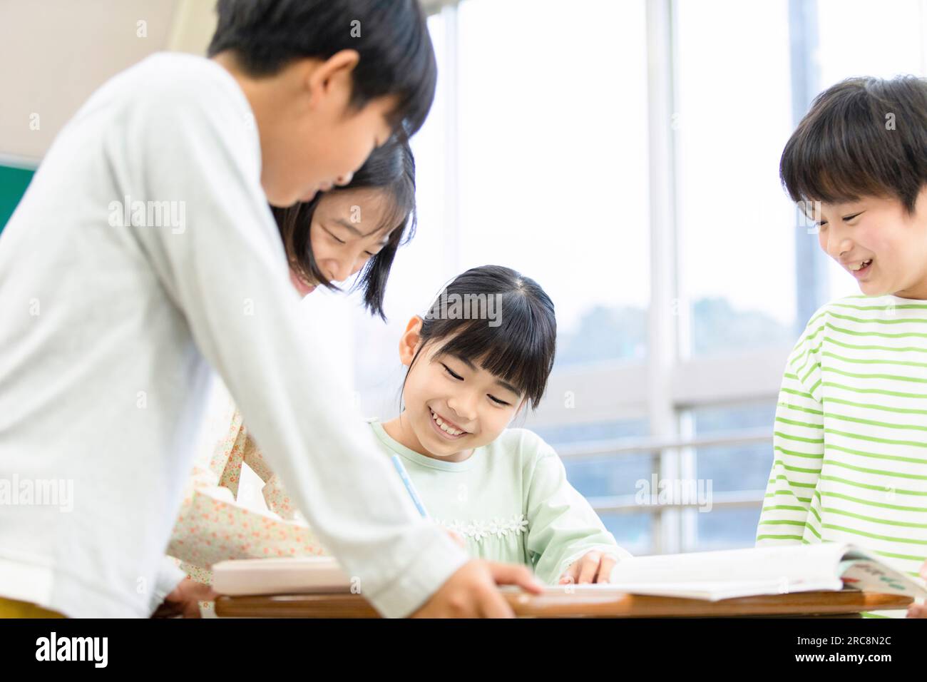 Children studying in the classroom Stock Photo - Alamy