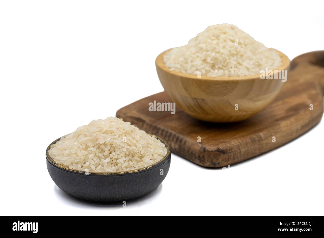 Dry Rice Images Raw rice isolated on white background. Uncooked dry rice in bowl Stock ...