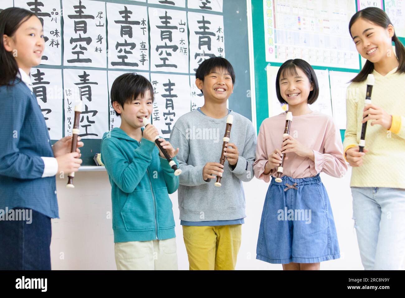 Elementary school students practicing the recorder Stock Photo Alamy