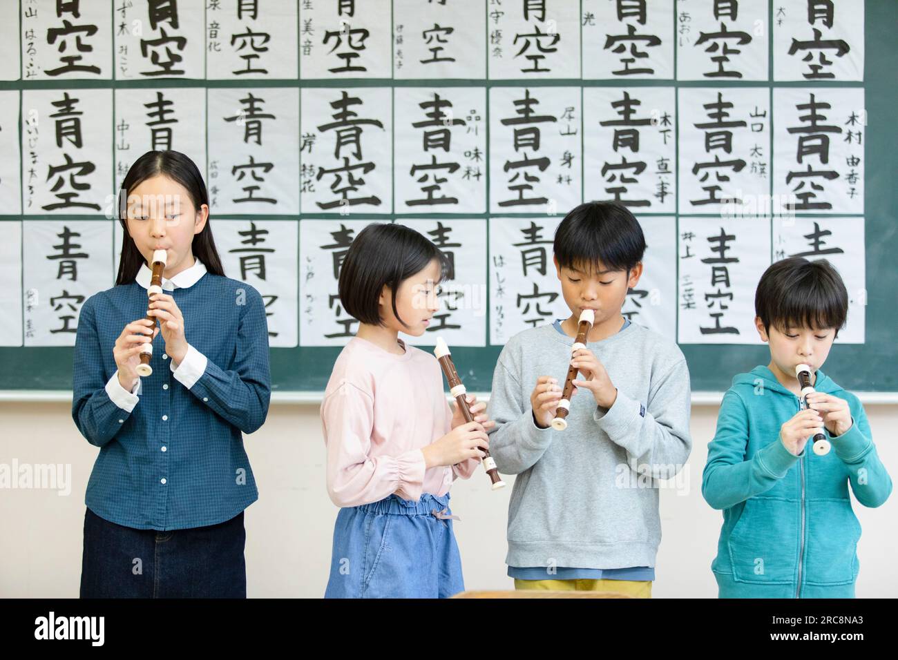 Elementary school students practicing the recorder Stock Photo Alamy