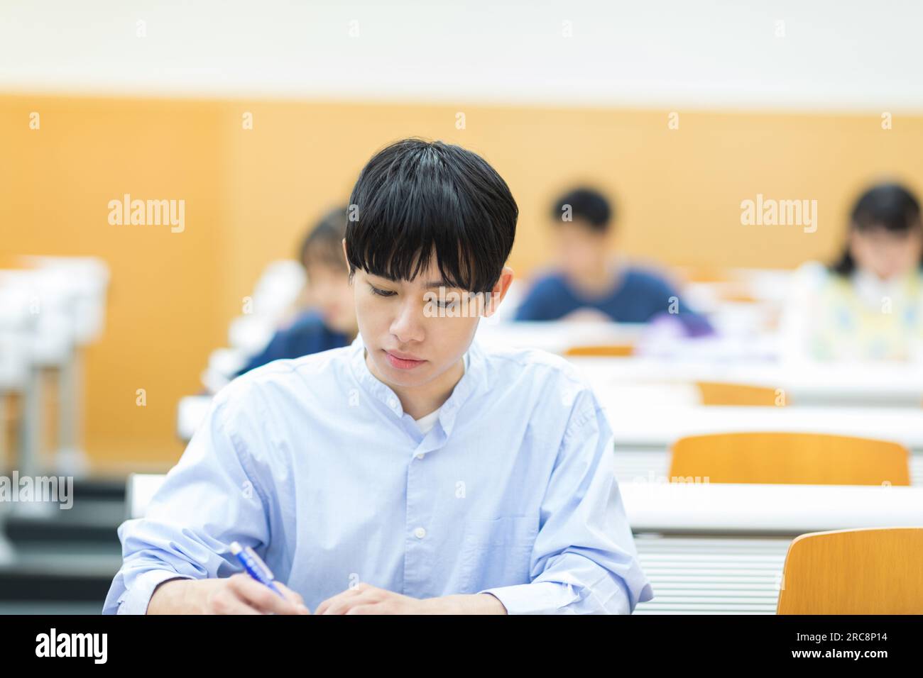 University students receiving a lecture Stock Photo - Alamy