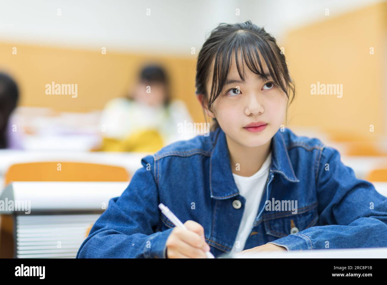 University students receiving a lecture Stock Photo - Alamy